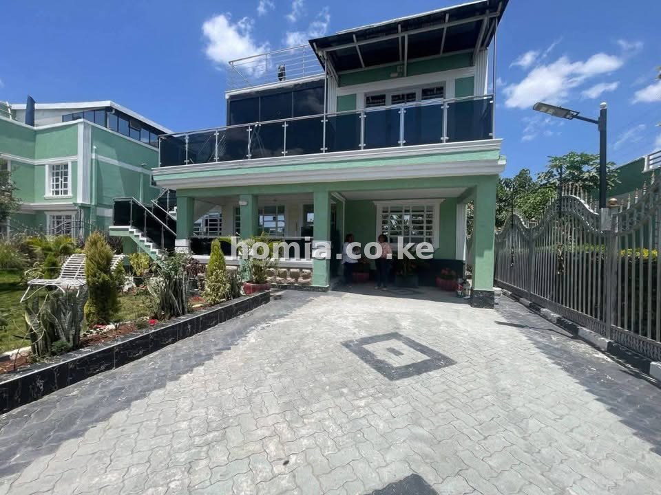 A 3-bedroom house for two people sharing a compound